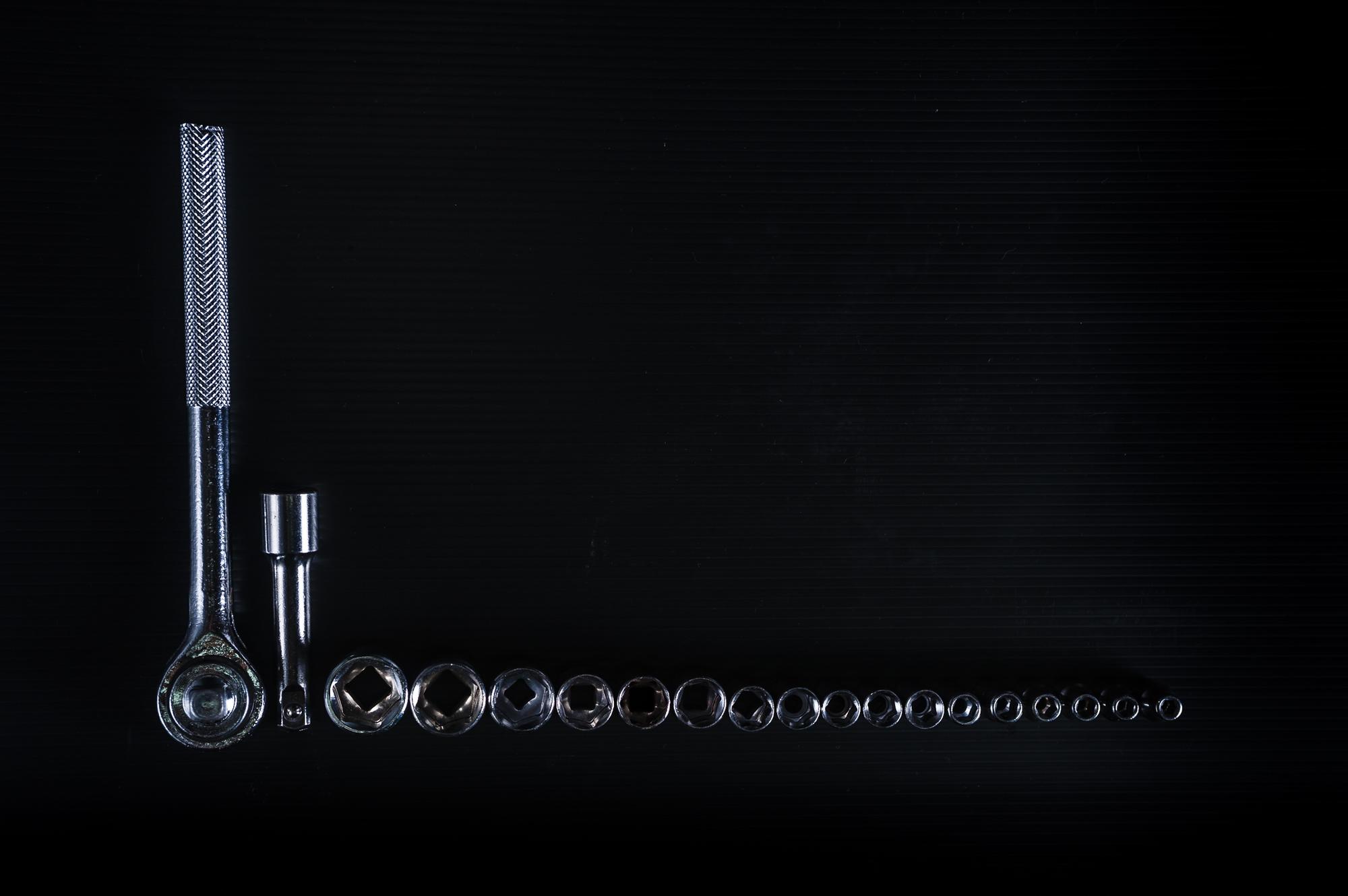 Tool layout on stainless bench with devices